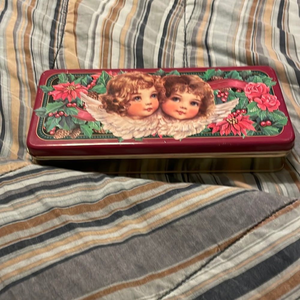 Brand new metal tin with angels on it